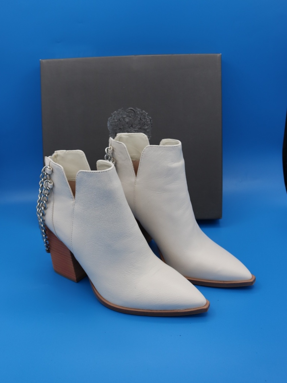 Vince Camuto "Gallzy" Off-White Leather Chain-Accent Booties